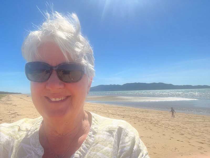 Selfie of Sue on a beach